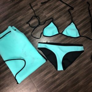 Triangl bathing suit with bag- worn twice